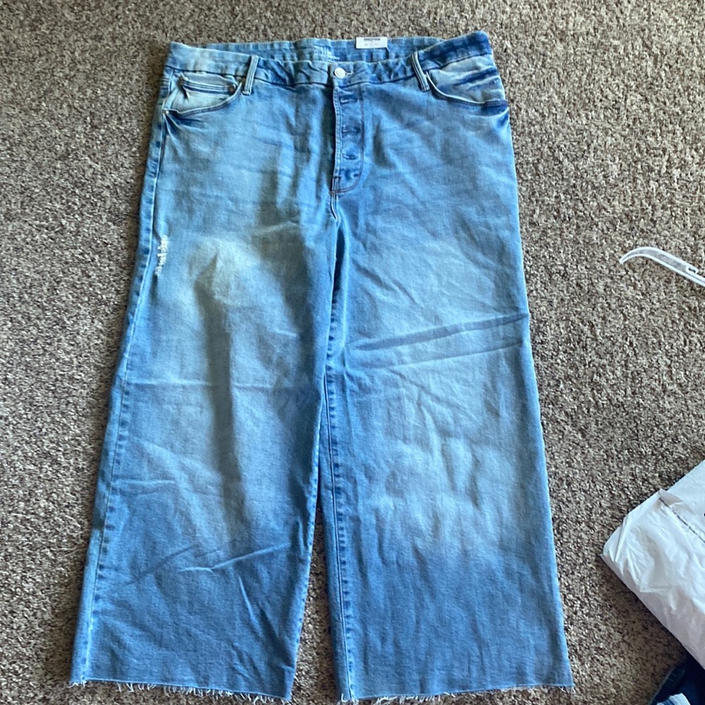 Wide leg light wash button fly jeans